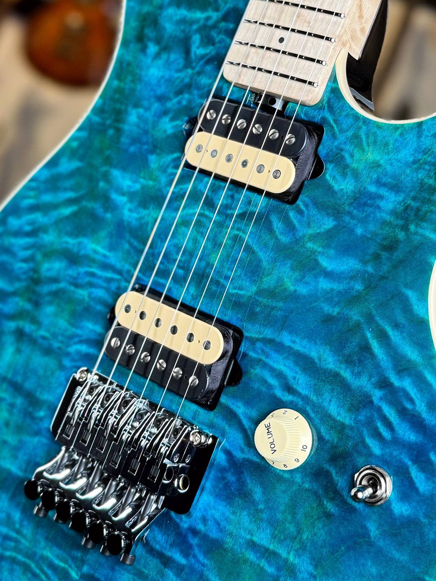 Ernie Ball Music Man 30th Anniversary Axis Limited Edition | Translucent Blue Quilt (#34 of 100)