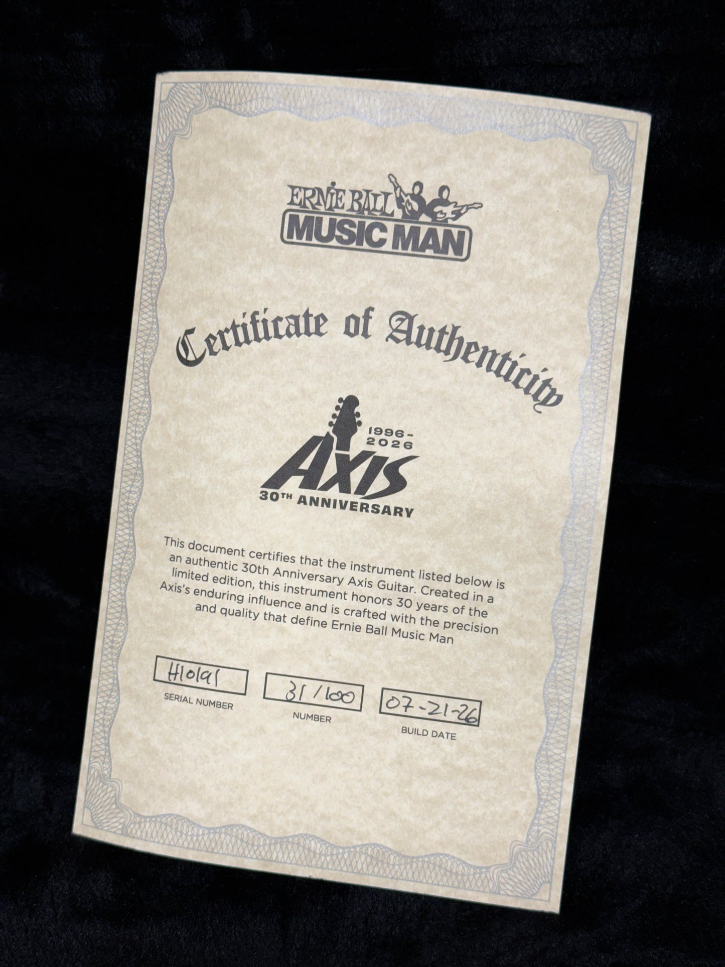 Ernie Ball Music Man 30th Anniversary Axis Limited Edition | Translucent Black Quilt (#31 of 100)