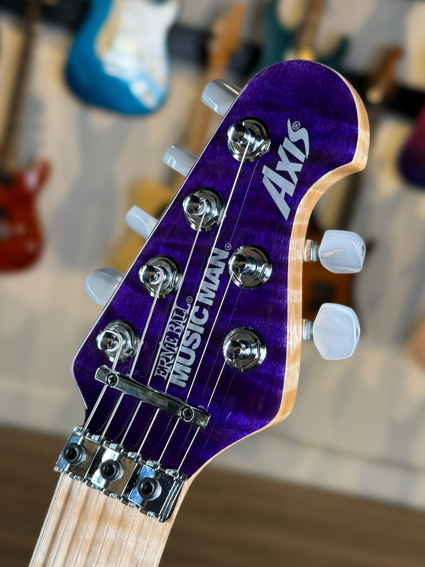 Ernie Ball Music Man 30th Anniversary Axis Limited Edition | Translucent Purple Quilt (#34 of 100)