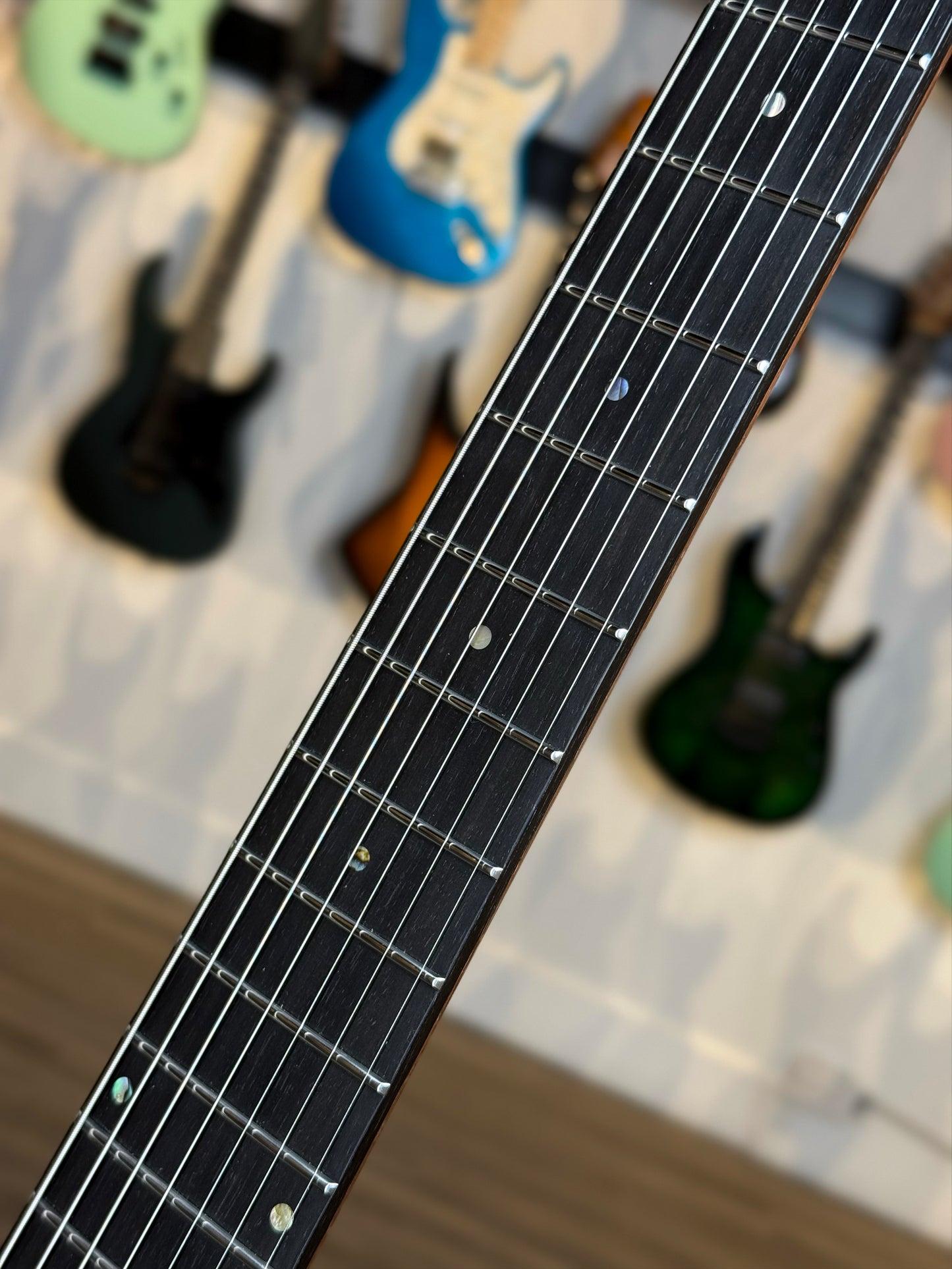 Mayones Aquila Elite S 7 B26.5 | Trans Natural Fade Graphite Burst Out Gloss